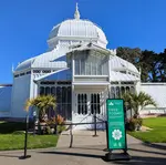 A sign announcing free day at the Conservatory of Flowers in Golden Gate Park