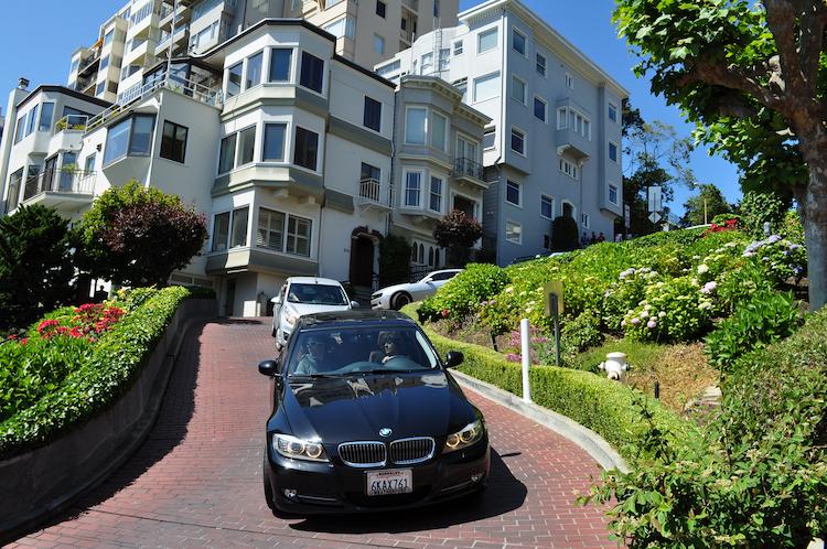 Cars coming down the steep Lombard Street hill
