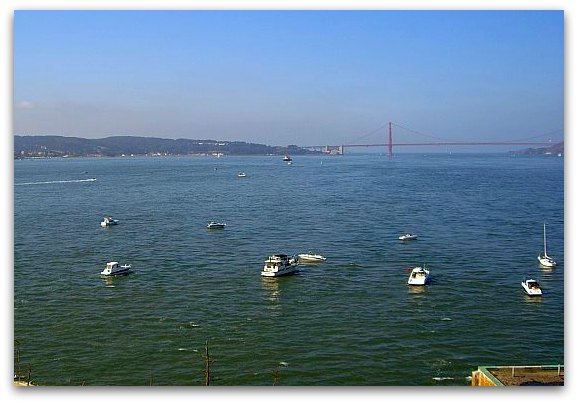 Several boats waiting, in the San Francisco Bay, for the Parade of Ships at the start of Fleet Week