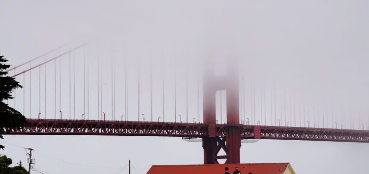 Southern Tower of the Golden Gate Bridge surrounded in Fog
