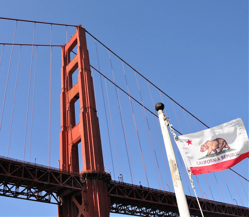 Golden Gate Bridge with the California State Flag Golden Gate Bridge with the California State Flag
