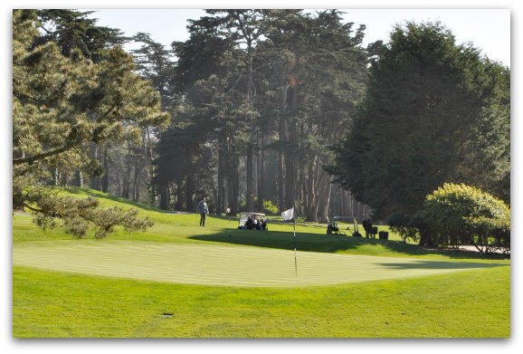 Golfers playing on the golf course in the Presidio.