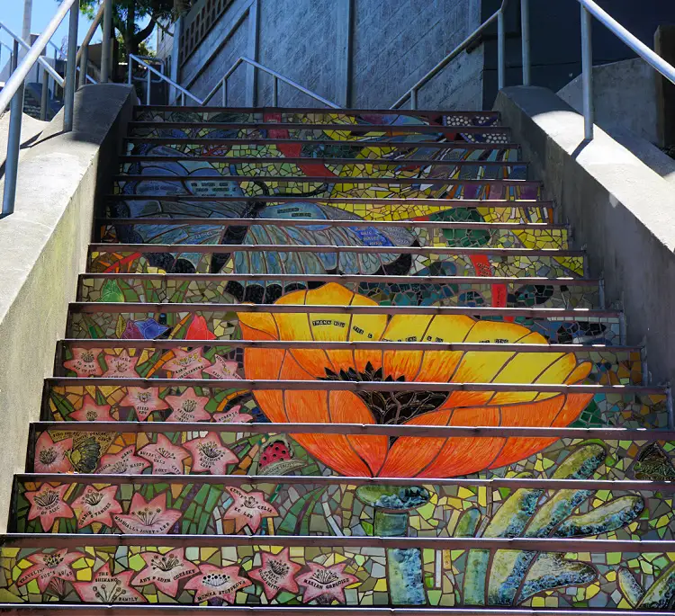 A big flower and butterfly on the Hidden Garden Steps in SF. A big flower and butterfly on the Hidden Garden Steps in SF.