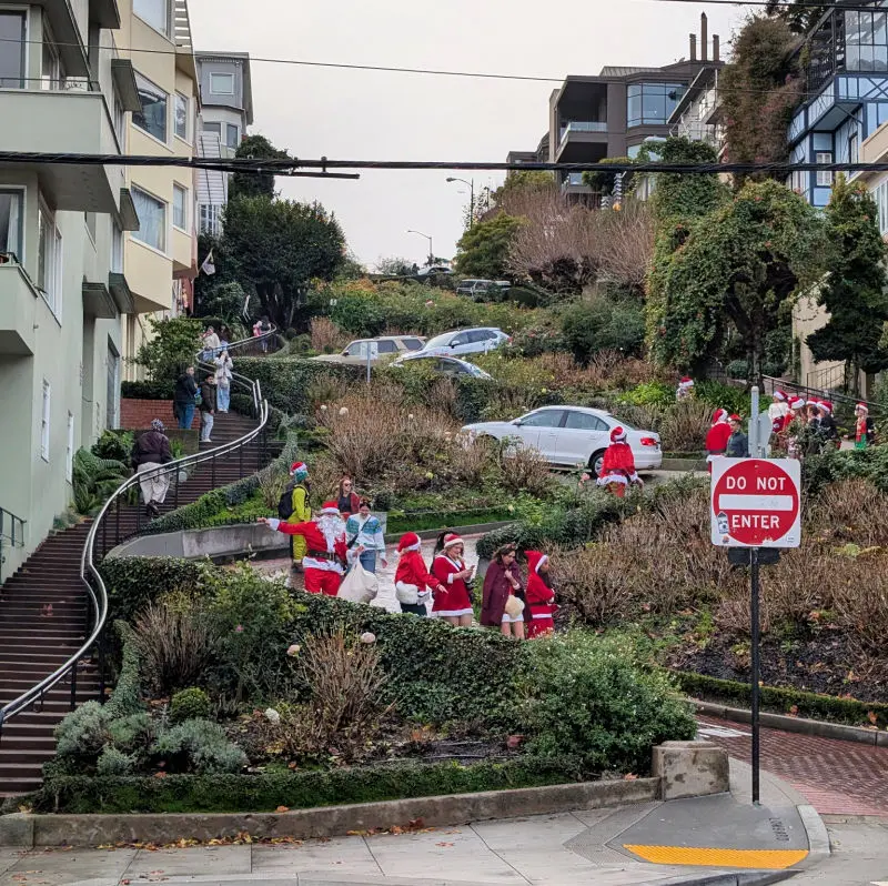 Santas walking down Lombard Street during Santacon Santas walking down Lombard Street during Santacon