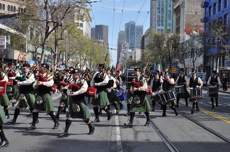 St. Patrick's Day bagpipes and drums make their way down Market Street