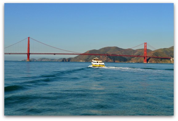 The Golden Gate Bridge behind the Blue and Gold Fleet Ferry