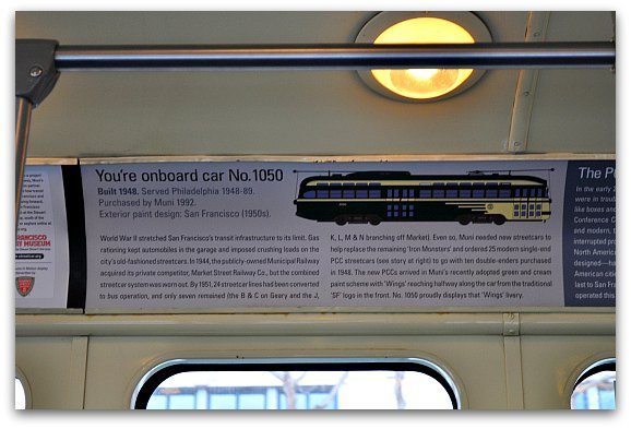 A sign inside an SF street car talking about its history and origins.