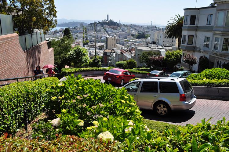 View of Coit Tower from the top of crooked Lombard Street